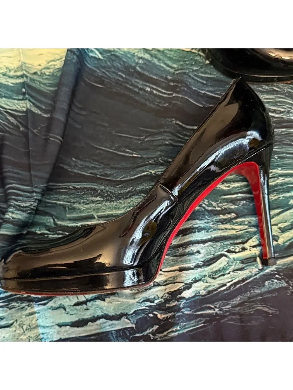Christian Louboutin sleek christian